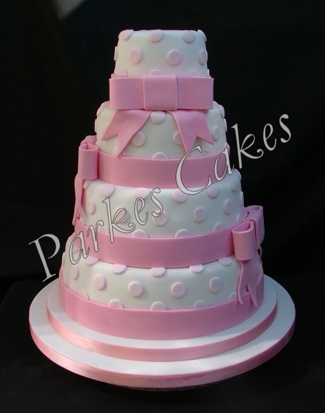 4 tier pink polka dot wedding cake